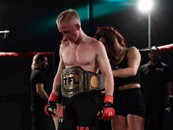Wrestling & Combat Sports